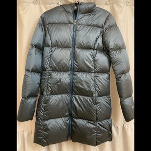 Women’s deep peacock blue Eddie Bauer goose down winter coat.